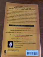 The Intern's Handbook: A Thriller by Shane Kuhn paperback (like new)