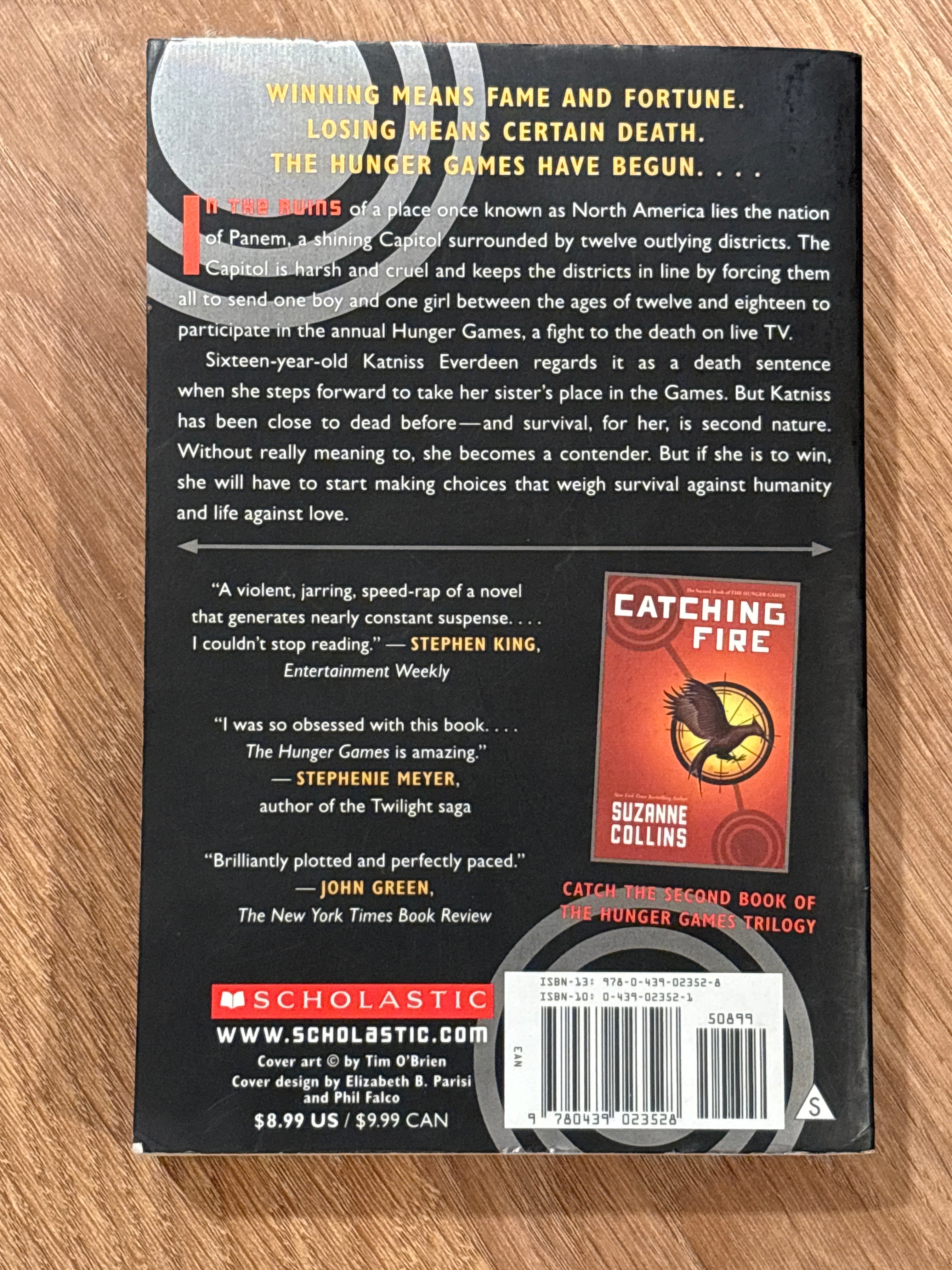 The Hunger Games (book 1 of the Hunger Games) by Suzanne Collin’s paperback BANNED BOOKS YA (like new)