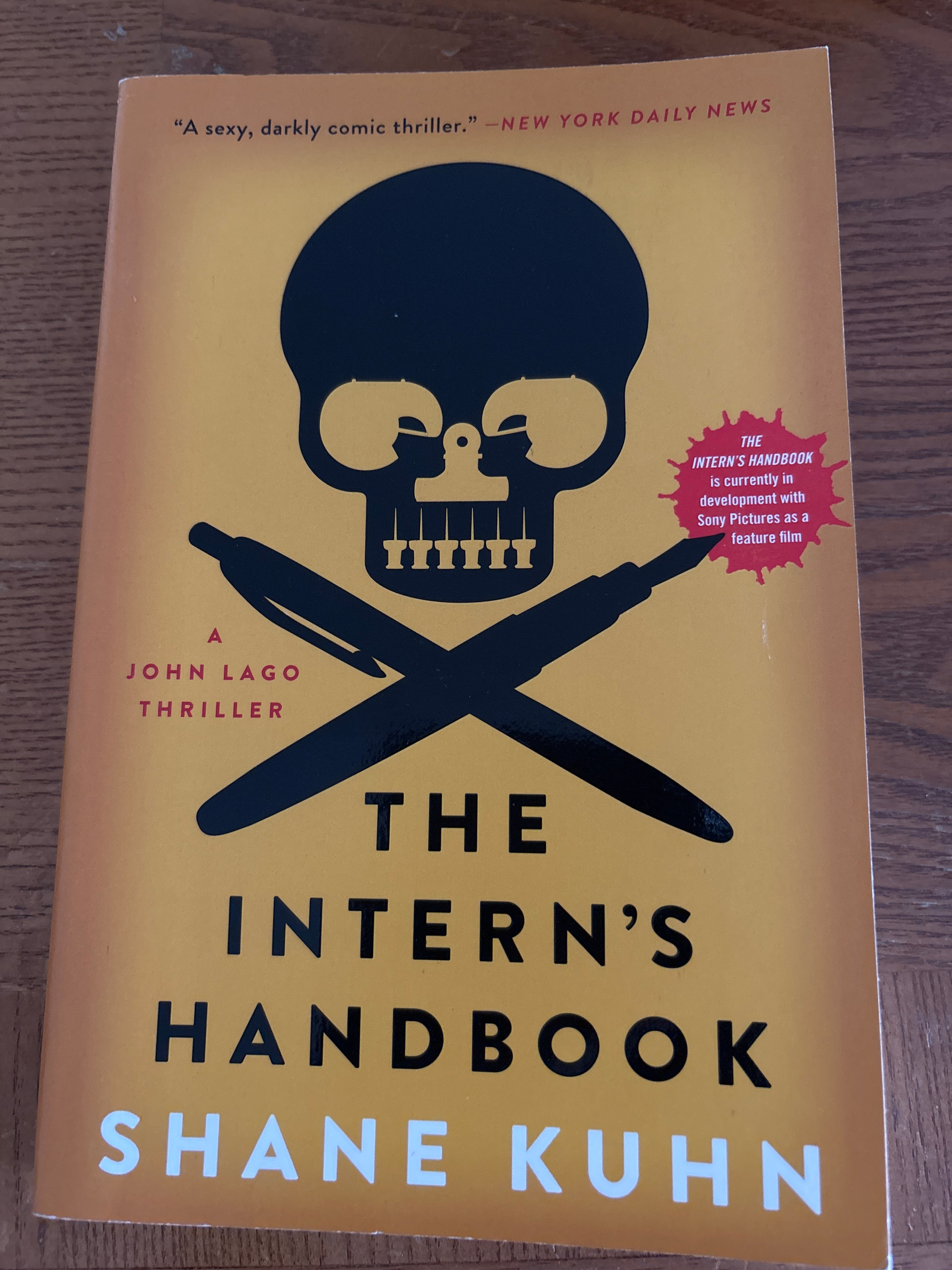 The Intern's Handbook: A Thriller by Shane Kuhn paperback (like new)