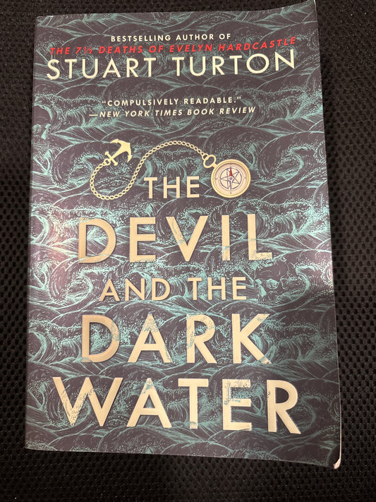 The Devil and the Dark Water by Stuart Turton rescued/paperback