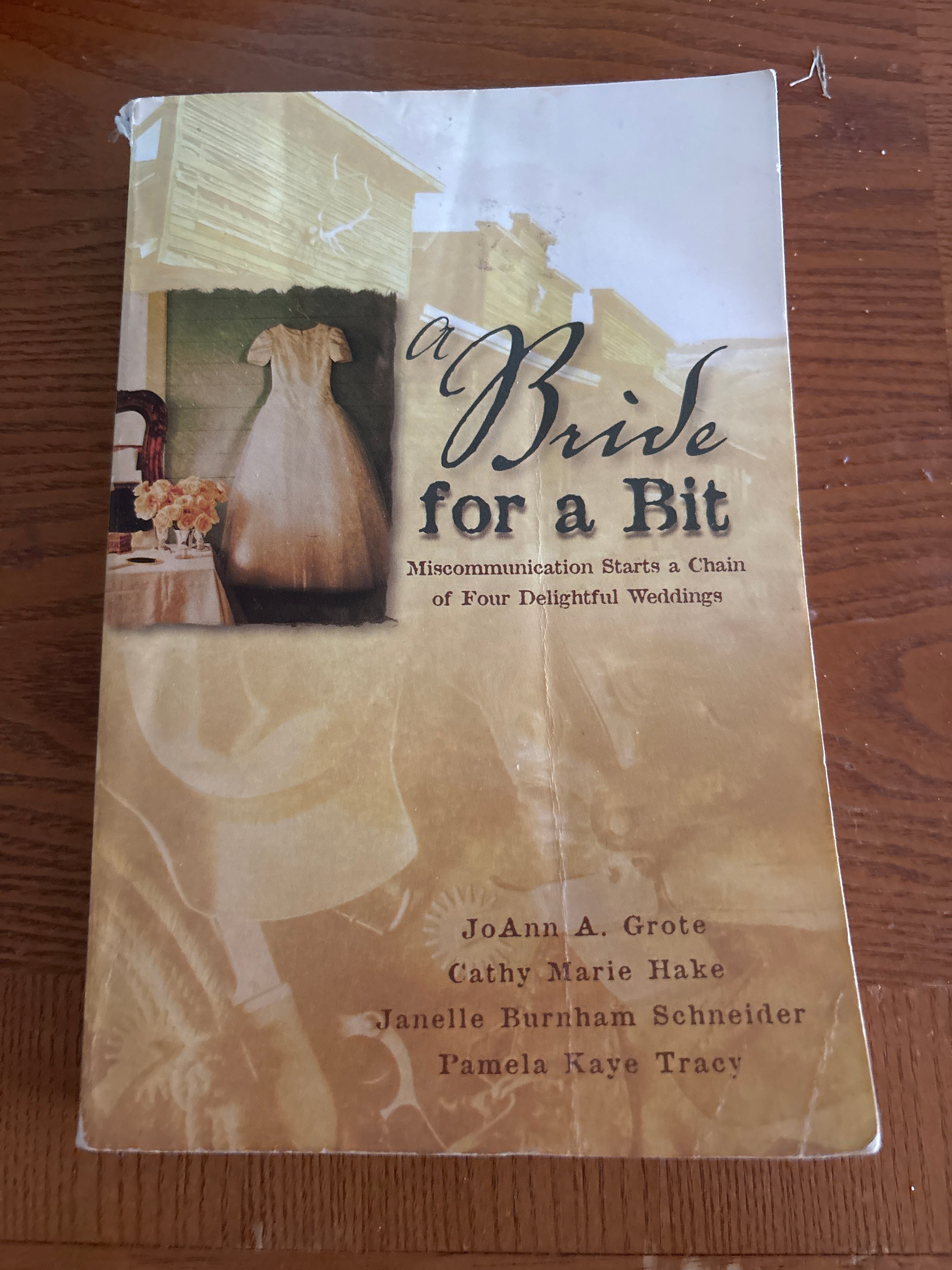 A Bride For A Bit (Inspirational Romance Collection) by JoAnn A. Grote, Cathy Marie Hake, Pamela Kaye Tracy, and Janelle Burnham Schneider paperback (rescued)