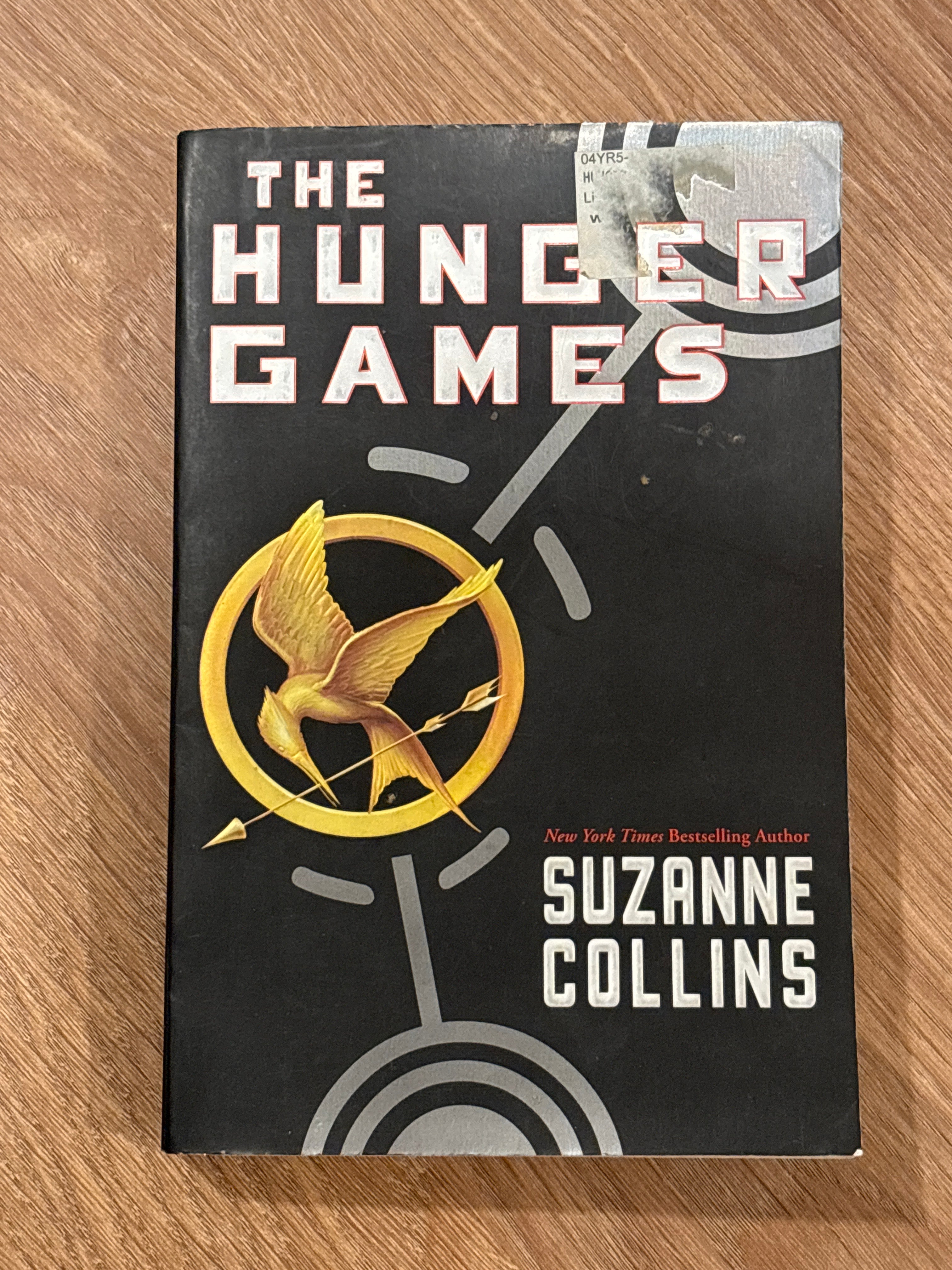 The Hunger Games (book 1 of the Hunger Games) by Suzanne Collin’s paperback BANNED BOOKS YA (like new)