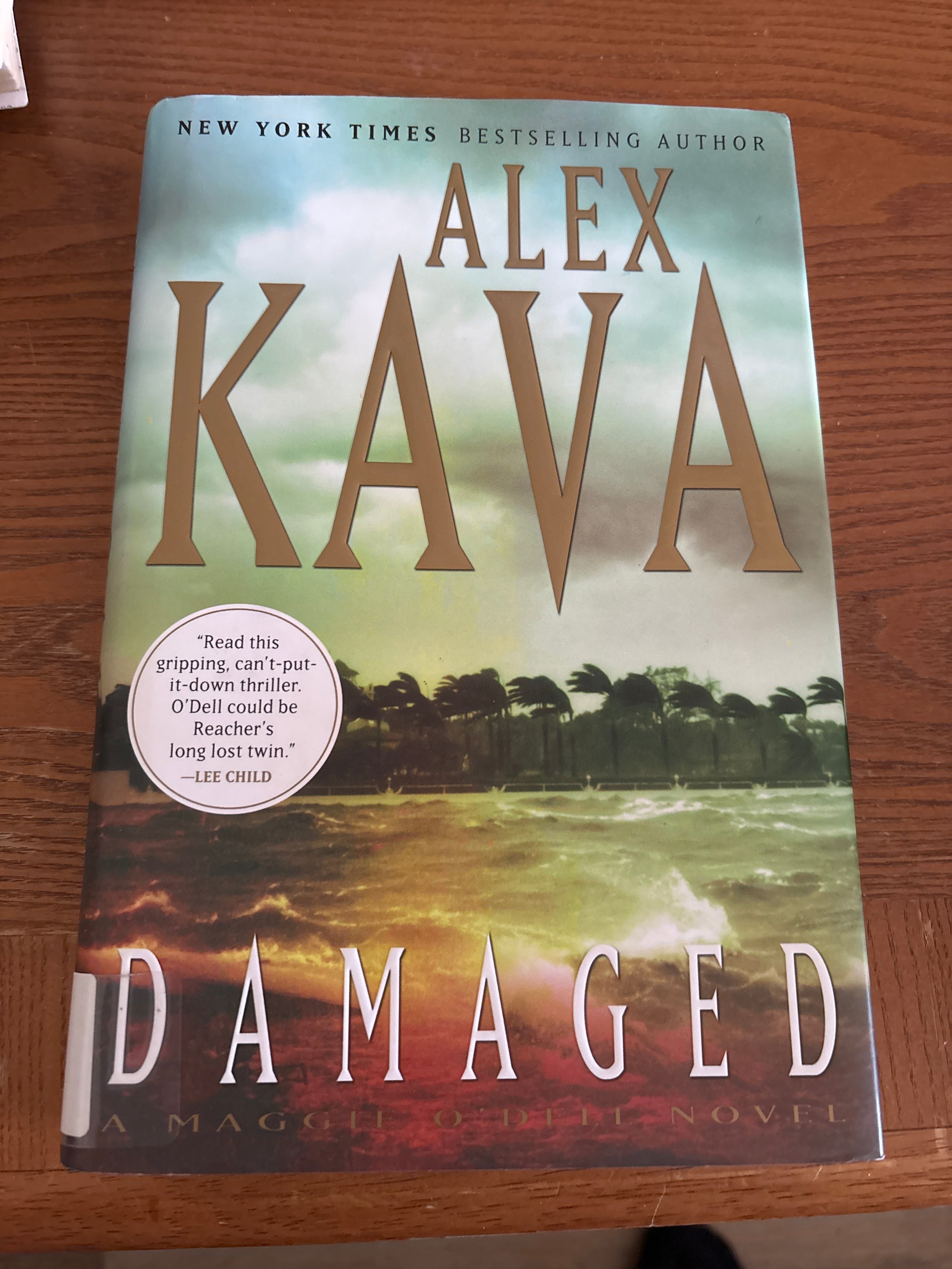 Damaged by Alex Kava FIRST EDITION hardcover (rescued library edition)