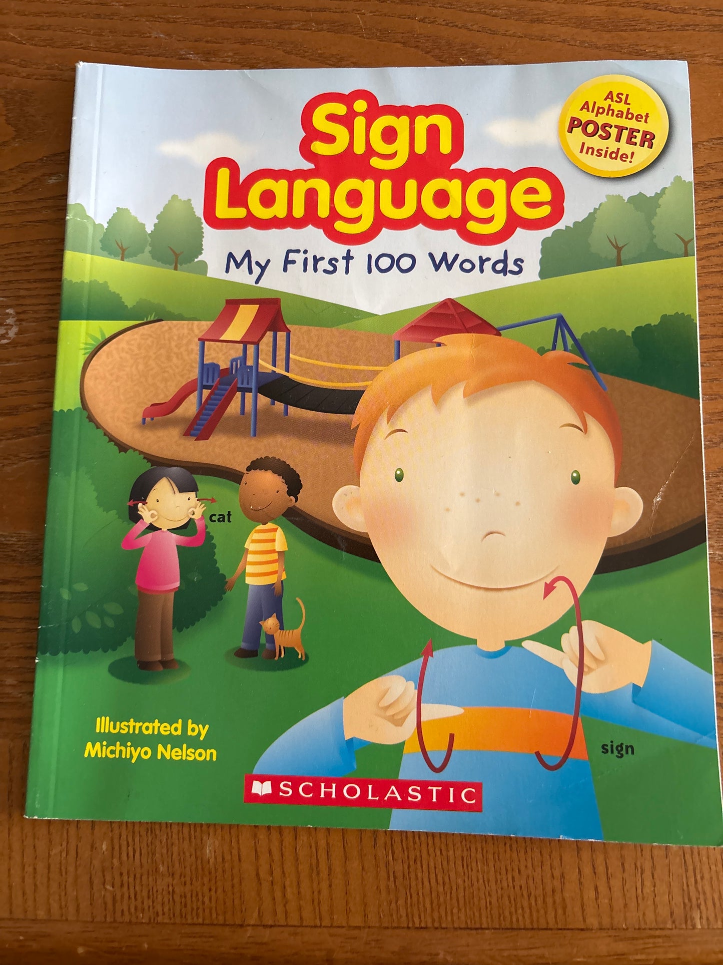 Sign Language my First 100 Words by Scholastic rescued/paperback