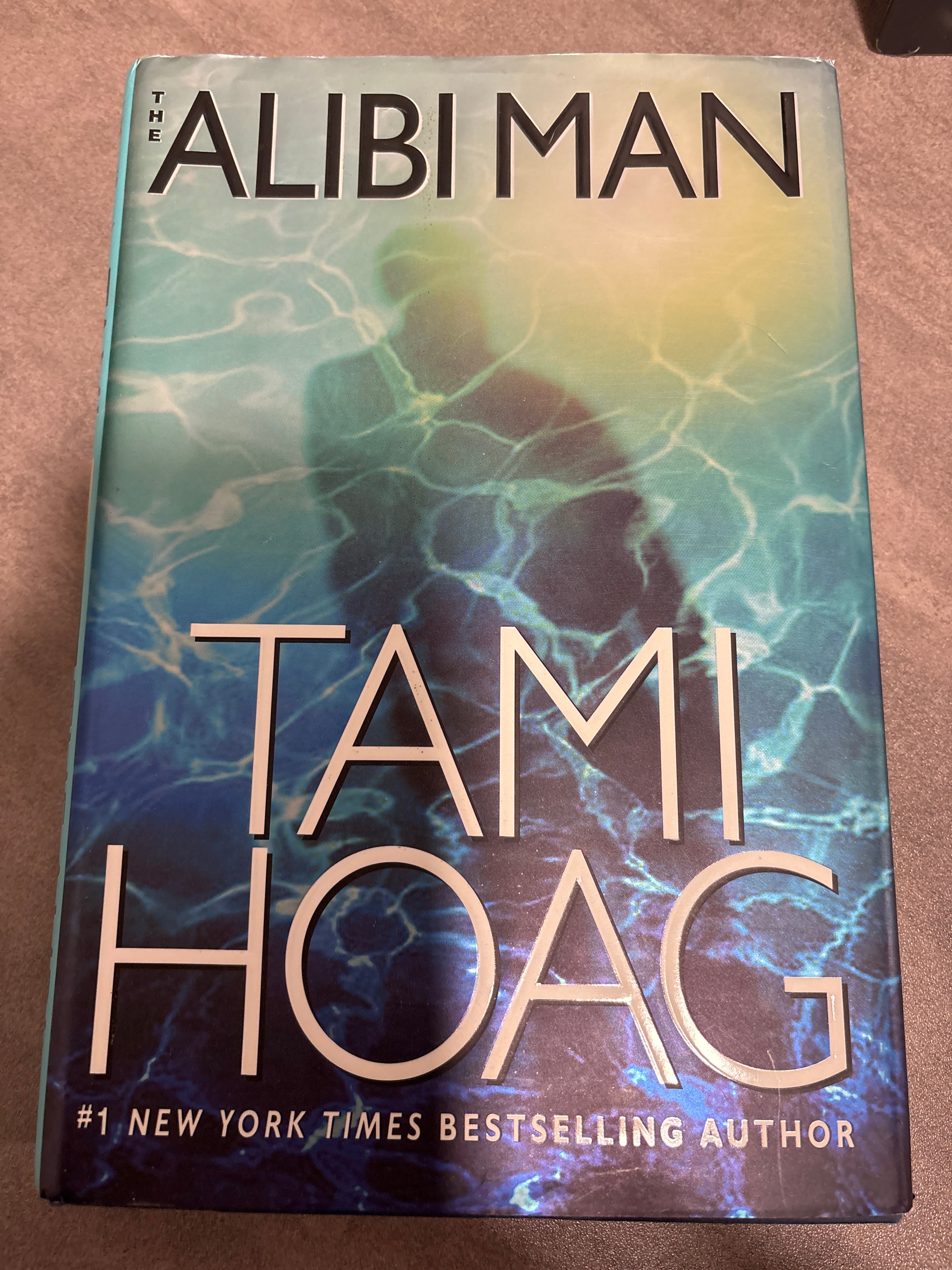 Alibi Man (book 2 of the Elena Estes series) by Tami Hoag hardcover (like new)