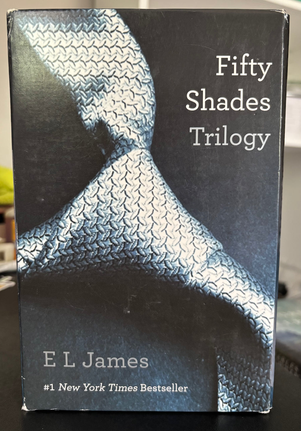 Fifty Shades Trilogy (Fifty Shades of Grey, Fifty Shades Darker, Fifty Shades Freed) by E.L. James paperback (rescued)