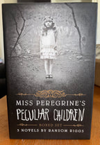 3 book box set, Miss Peregrine's Home for Peculiar Children, Hollow Ciity, and Library of Souls by Ransom Riggs (the first 3 books of Miss Peregrine‘s Peculiar Children series) plus additional pictures hardcover YA (like new)