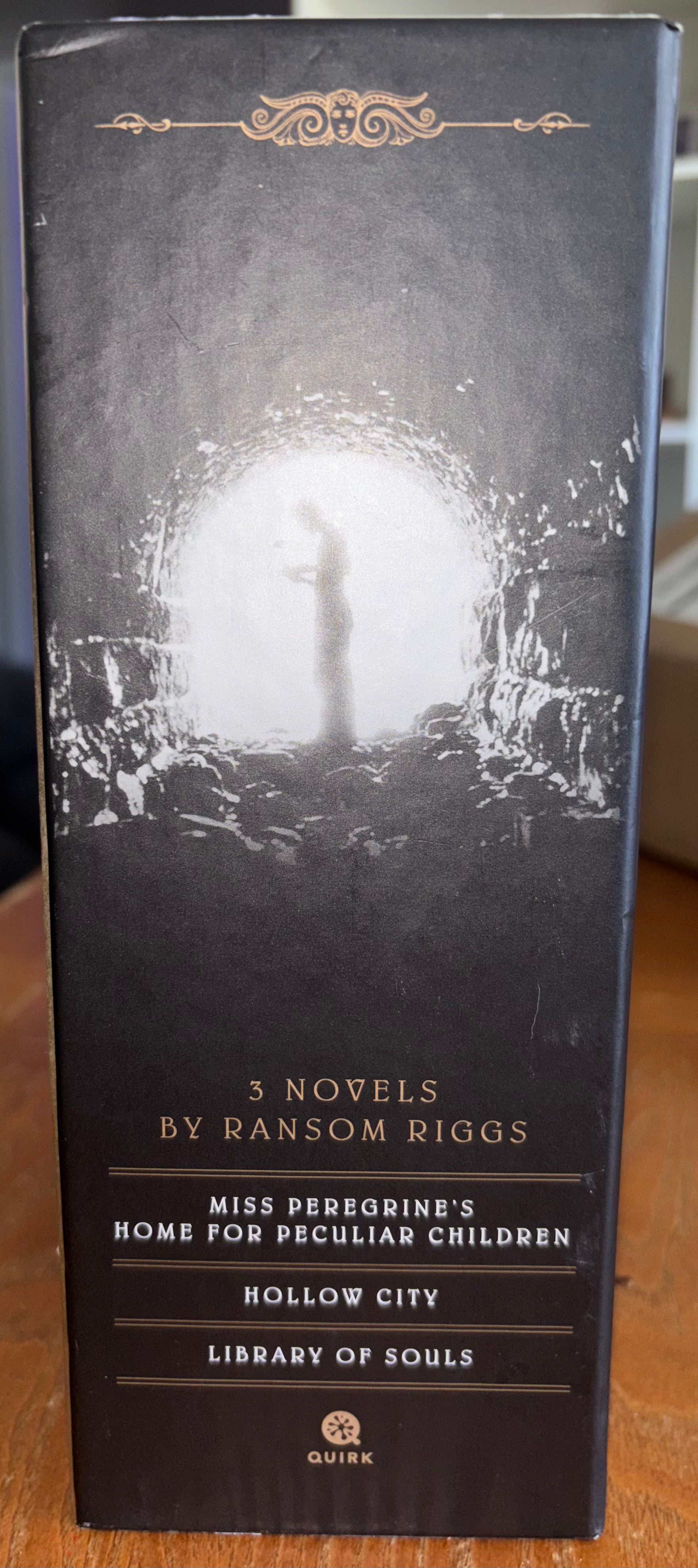 3 book box set, Miss Peregrine's Home for Peculiar Children, Hollow Ciity, and Library of Souls by Ransom Riggs (the first 3 books of Miss Peregrine‘s Peculiar Children series) plus additional pictures hardcover YA (like new)
