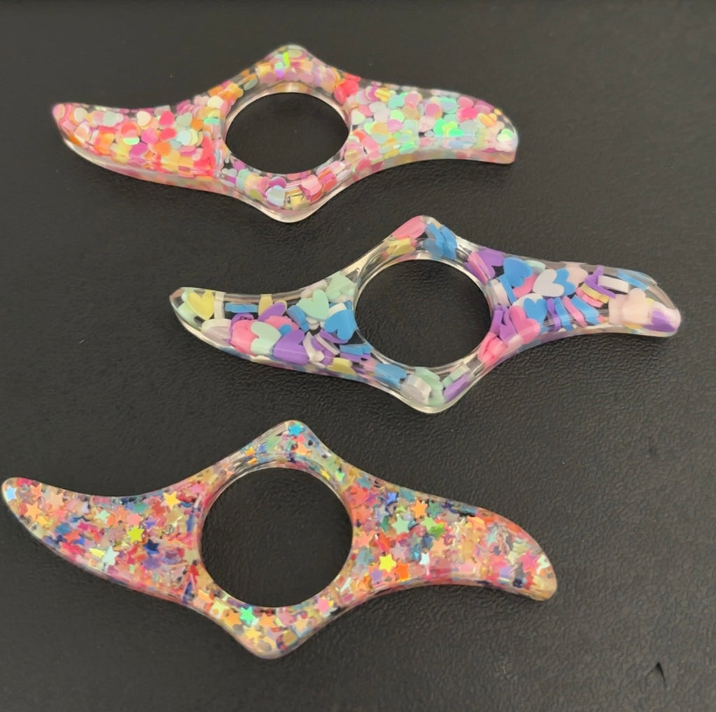 Thumb book page holder resin