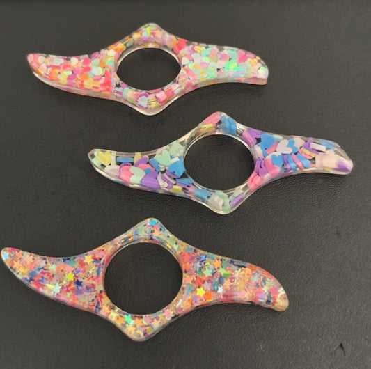 Thumb book page holder resin