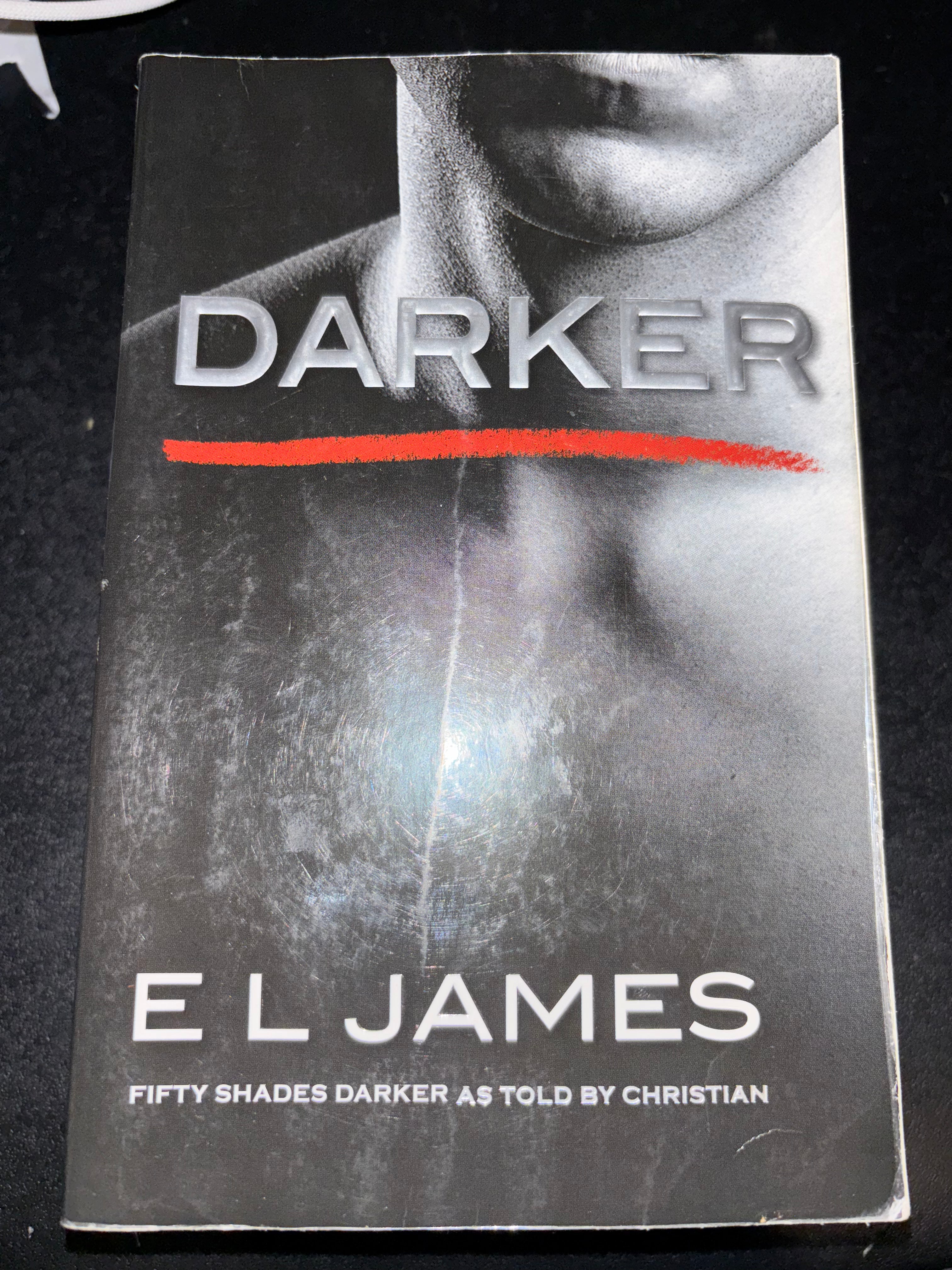 Darker (Book 2 of the Fifty Shades as told by Christian series) by E.L. James paperback (rescued)