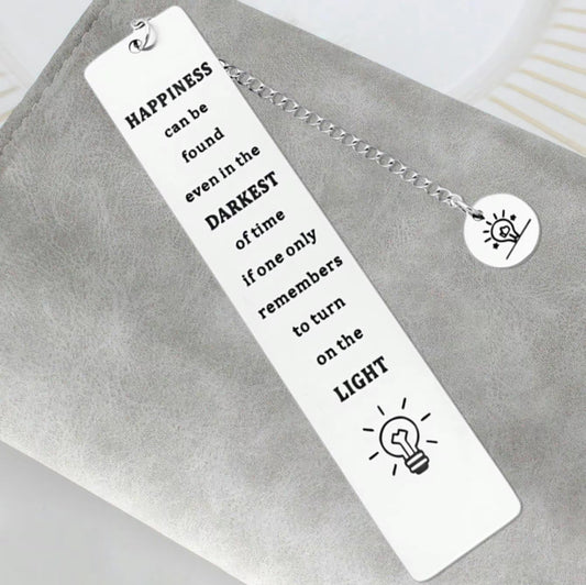 Metal Bookmark ‘Happiness Can Be Found Even in the Darkest of Times if One Only Remembers to Turn on the Light’ with lightbulb pendant