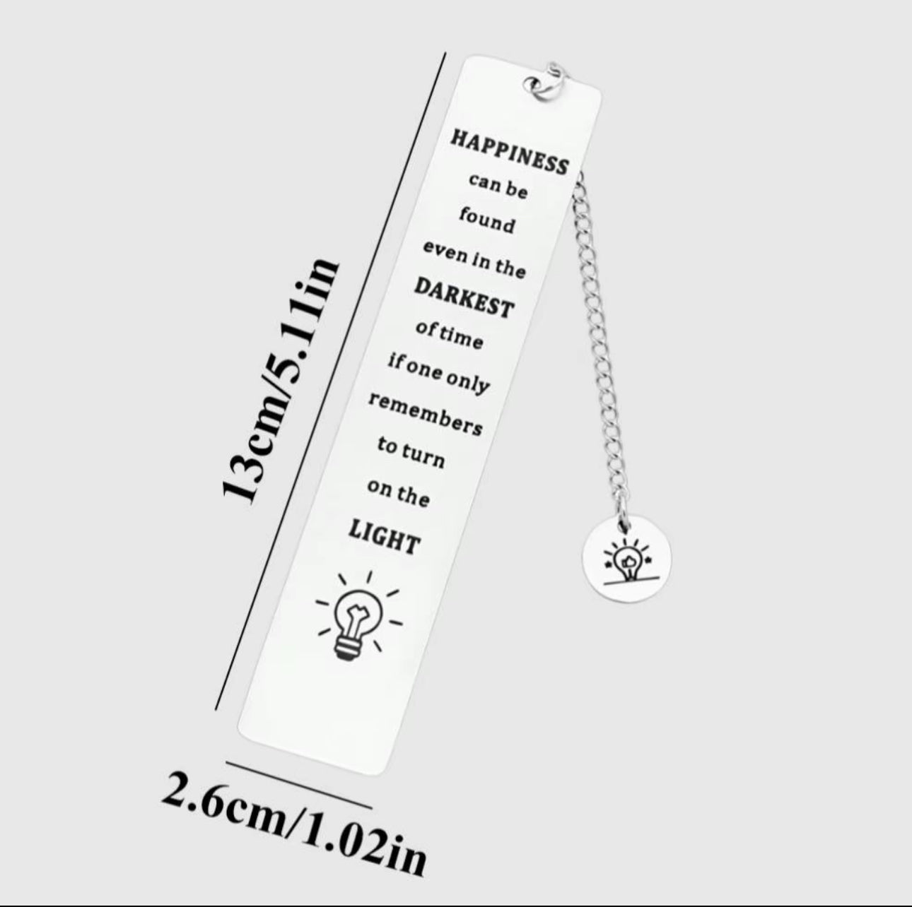 Metal Bookmark ‘Happiness Can Be Found Even in the Darkest of Times if One Only Remembers to Turn on the Light’ with lightbulb pendant