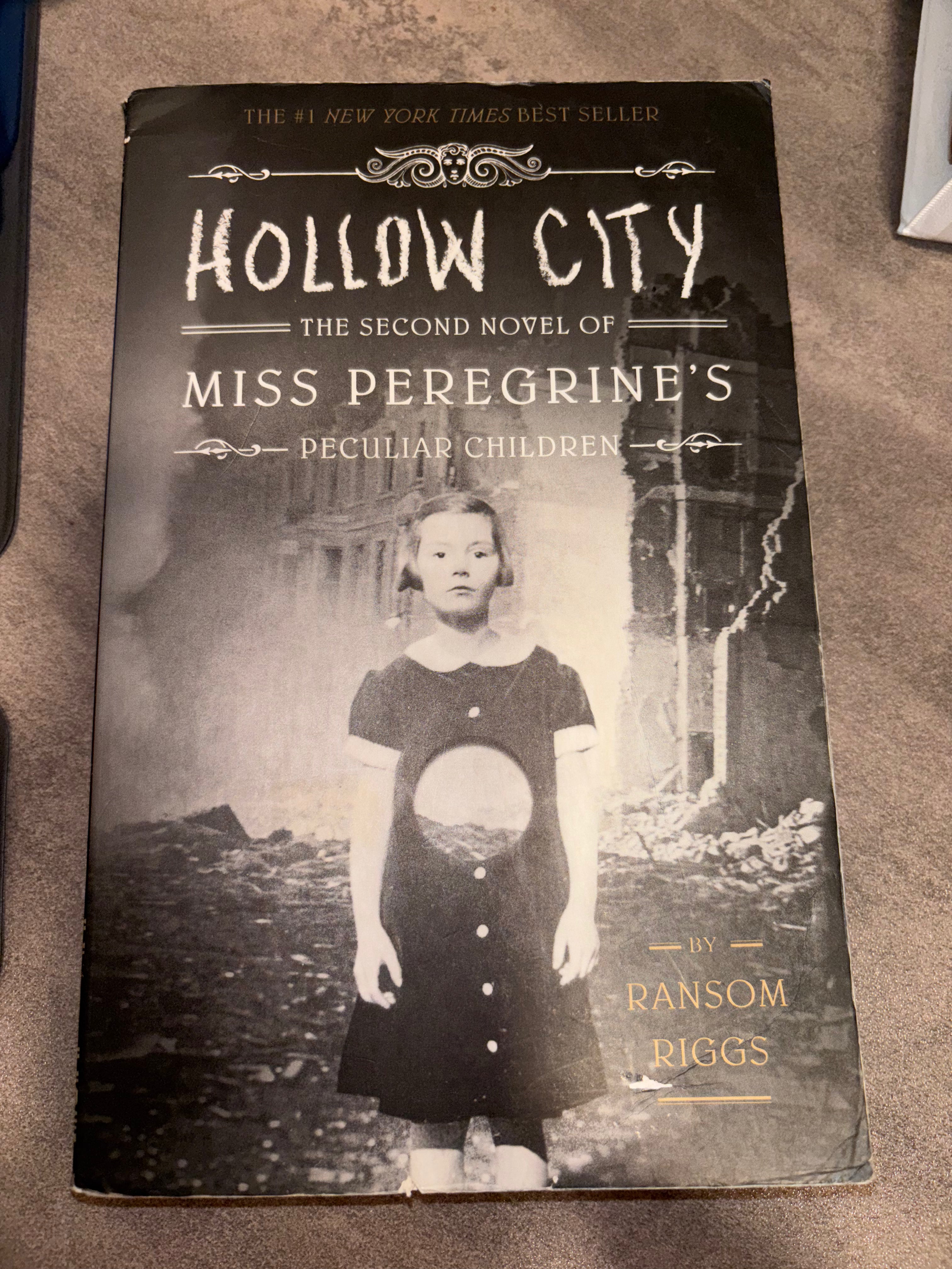 Hollow City (book 2 of Miss Peregrine‘s Peculiar Children series) by Ransom Riggs paperback YA (like new)